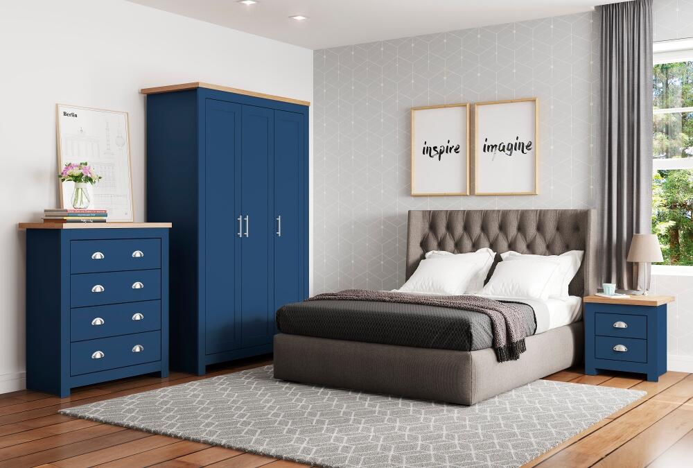 blue bedroom with oak furniture